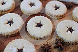 Close-up of traditional linzer cookies on the wooden background