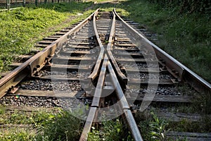 Train railway tracks crossing in Gryfice, Poland.