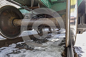 Close-up of train wheels. Bottom view. Winter