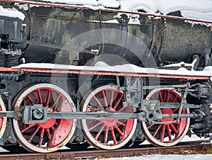 Close up with train wheels on track. Wheels of a train on the railway tracks