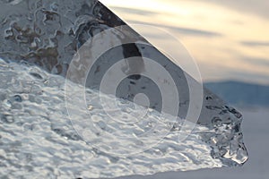 A close up of a transparent ice