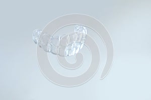 Close-up of transparent Silicone Night Mouth Guard for Teeth Clenching Grinding Dental Bite Sleep Aid, concept dental services,