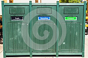 Close up of Trash, Recycling and Compost bins