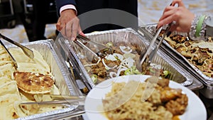 Close up of Triangle Buffet Dishes Dinnerware Chafing Dish in the venue event. Move camera