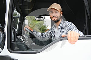 Close up of truck driver behind steering wheel. Copy space