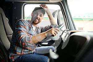 Close up of truck driver behind steering wheel. Copy space.