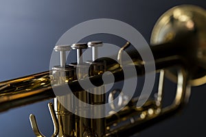 Close up of a Trumpet on a dark background