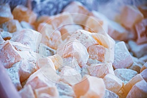 Close up Turkish delight lokum with powdered sugar