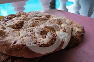 Close up of Turkish Ramadan Pita. bread. Traditional Ramadan food as known Ramazan Pidesi Pide. photo