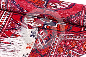 Close up of Turkmenian rug and edges photo