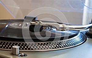 Close up of a turntable needle head