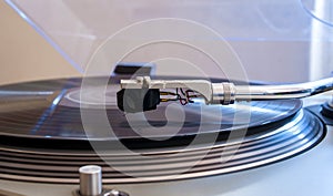 Close up of a turntable needle head