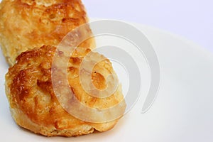 Close up of two Bisquets isolated