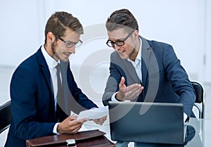 Close up.two business men discussing a business document