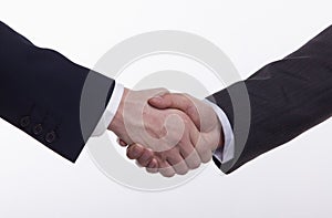 Close up of two Businessmen shaking hands, studio shot