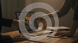 Creative Team Collaborating on a Digital Project at Night