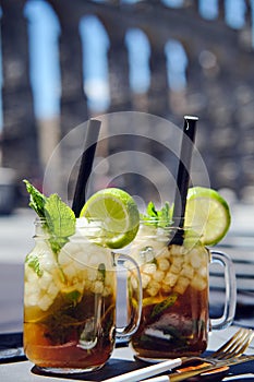 Close up two cups with mojito cocktails