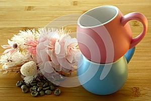 Close up of two cute coffee cups, a beautiful addition to any kitchen or a cafe.