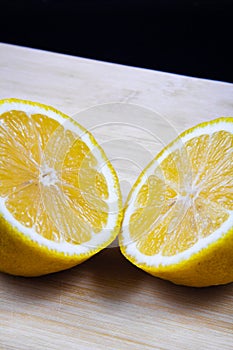 Close-up of two fresh lemon halves