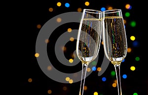 Close-up of two glasses with bubbly champagne