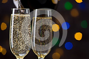 Close-up of two glasses filled with champagne