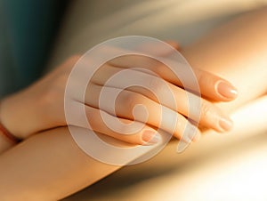 Close-up of two hands gently