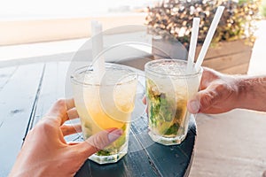 Close-up of two mojito cocktails on the table