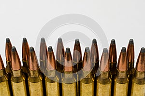 Close-up of two rows of bullets with white space