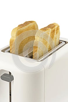 A close up of two slices of golden brown toast in an electrical toaster