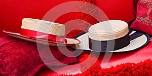 Close Up of Two Straw Hats on Red Gondola Seats In Venice