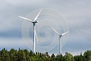 Close-up of two wind turbines