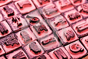 Close up of type set rubber stamps