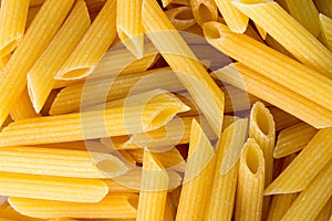 Close up of uncooked dry pene pasta