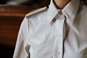 Close up unrecognizable serious mature male man professional marine sailor proud officer elegant suit white uniform