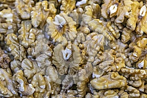 Close up unshelled walnuts in bulk