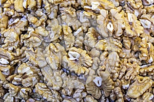 Close up unshelled walnuts in bulk