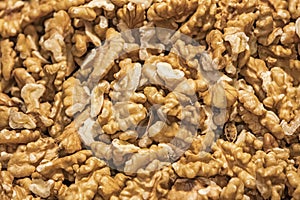 Close up unshelled walnuts in bulk