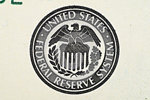 Close up on US dollar banknotes. U.S. Treasury Seal on US Dollar banknotes. Shooting by 1:1 Macro lense. I