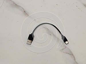 Close-up of USB Cable Connector on White Background