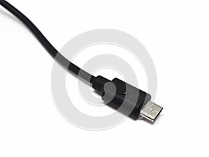 Close-up USB cable isolated on a white background. Black color micro usb cable