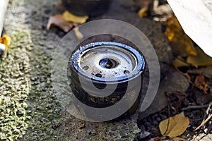 Close up used car oil filter