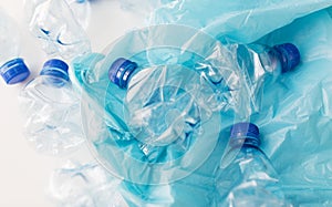 Close up of used plastic bottles and rubbish bag