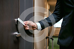 Close-up of using keycard to open the door or scan keycard open door for chance