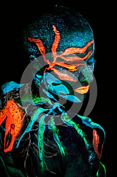 Close up UV portrait of a bodyart flamengo