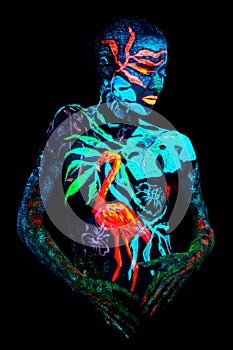 Close up UV portrait of a bodyart flamengo