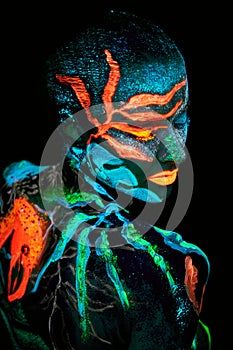 Close up UV portrait of a bodyart flamengo photo