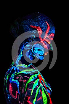Close up UV portrait of a bodyart flamengo photo