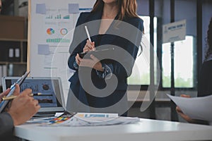 Close up ux developer and ui designer use augmented reality brainstorming about mobile app interface wireframe design on desk