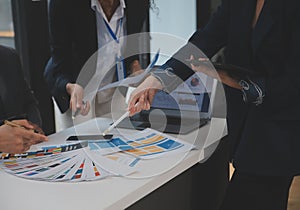 Close up ux developer and ui designer use augmented reality brainstorming about mobile app interface wireframe design on desk at