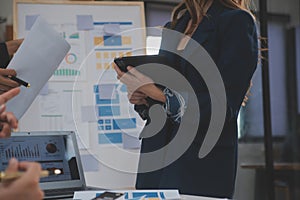 Close up ux developer and ui designer use augmented reality brainstorming about mobile app interface wireframe design on desk at